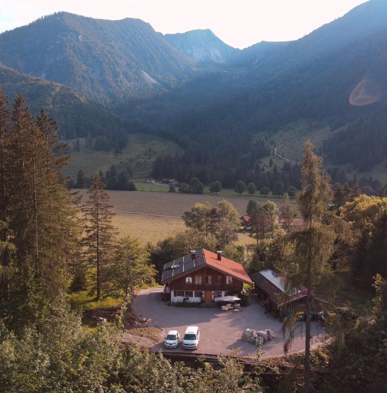an aerial view of a house in the mountains at Einzigartiges Berg-Chalet in Alleinlage bis zu 21 Personen in Bayrischzell