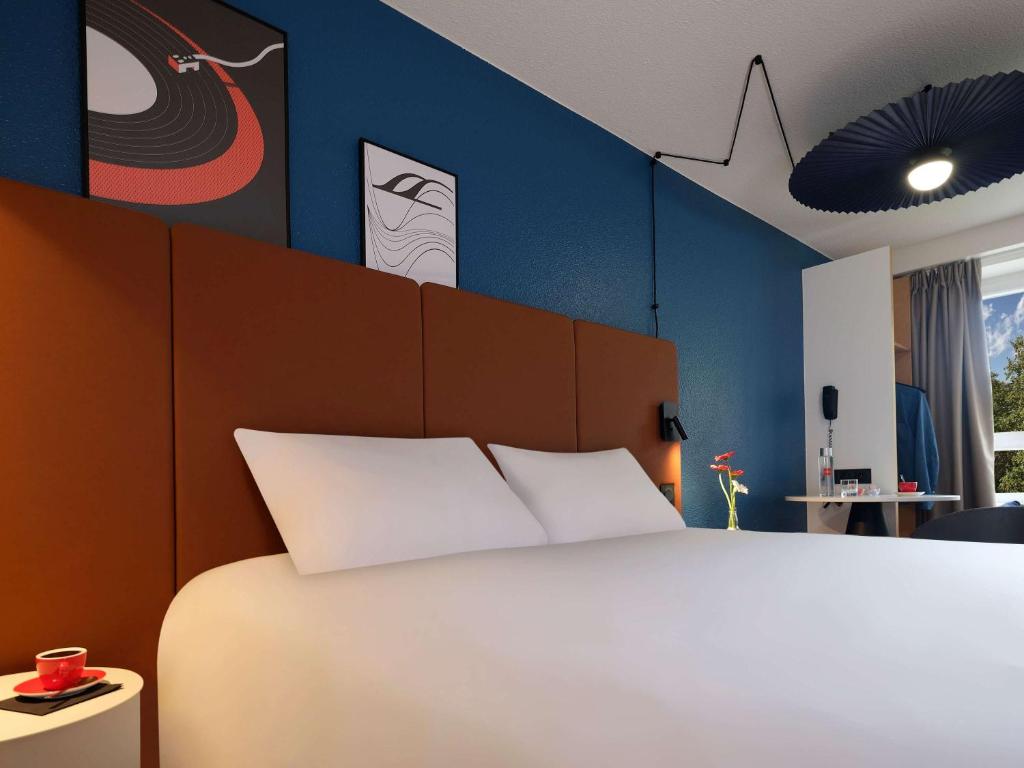 Postel nebo postele na pokoji v ubytování ibis Toulouse Pont Jumeaux