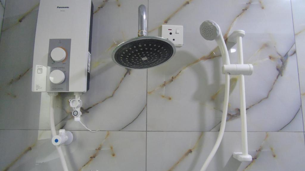Koupelna v ubytování Ro Rich Hotel