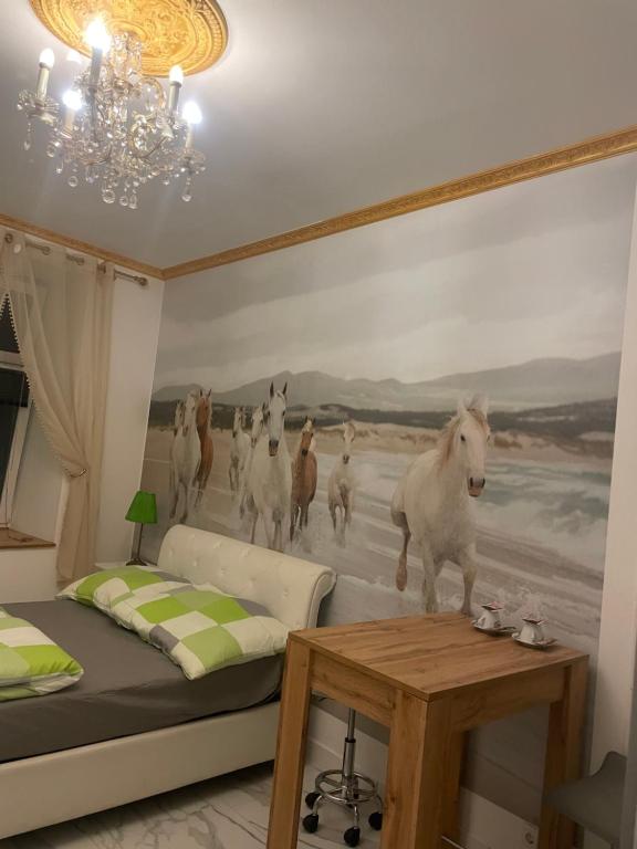 A bed or beds in a room at Viktoria ARTUR