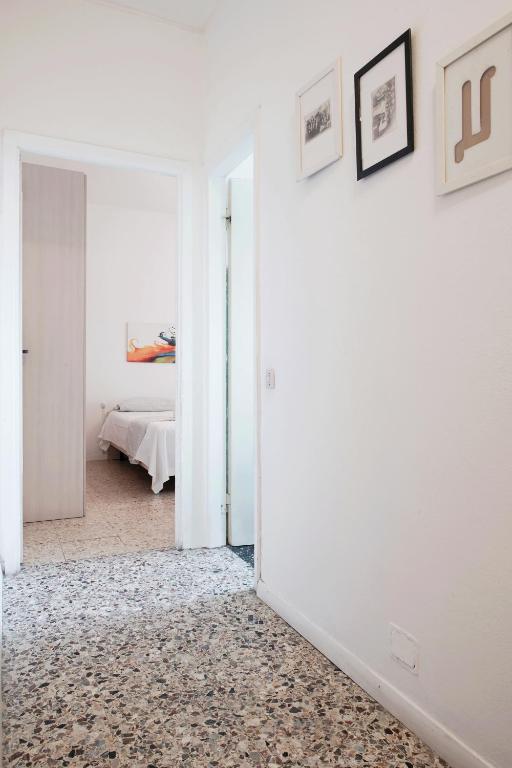 Posteľ alebo postele v izbe v ubytovaní Enjoy Apartment Gorla