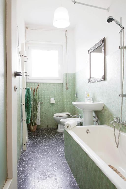Kúpeľňa v ubytovaní Enjoy Apartment Gorla