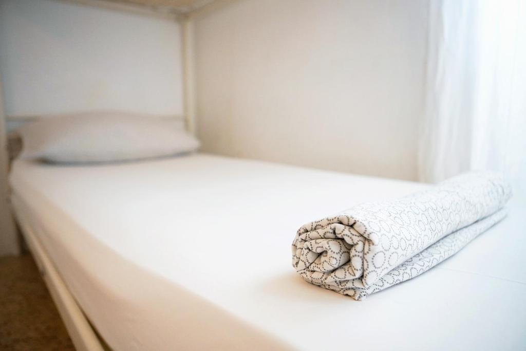 Posteľ alebo postele v izbe v ubytovaní Enjoy Apartment Gorla