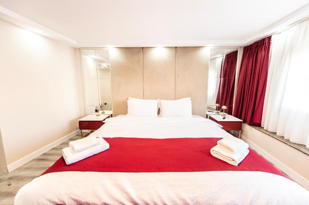 Postel nebo postele na pokoji v ubytování Hidden Pearls Boutique Hotel