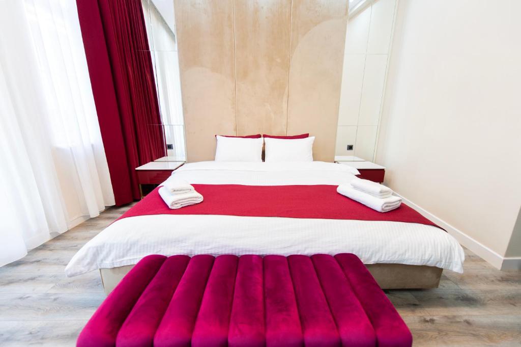 Postel nebo postele na pokoji v ubytování Hidden Pearls Boutique Hotel