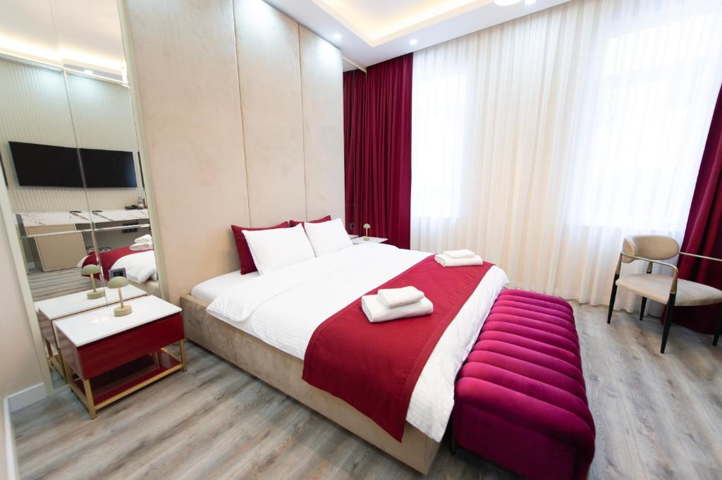 Postel nebo postele na pokoji v ubytování Hidden Pearls Boutique Hotel