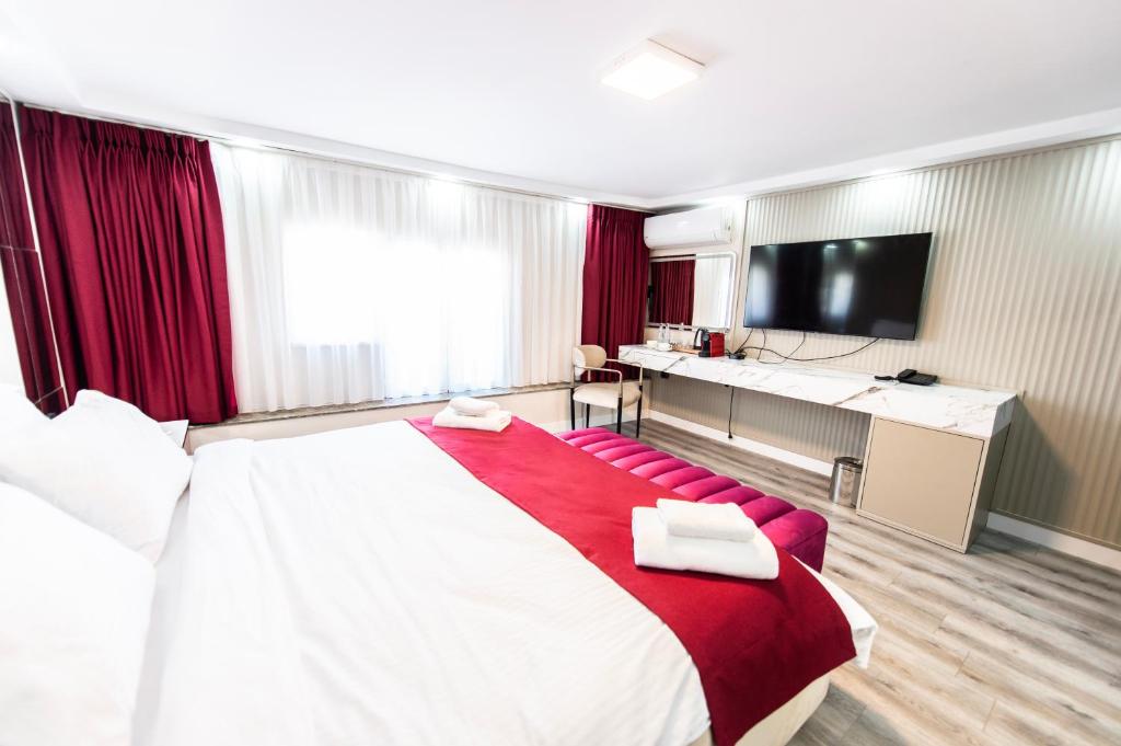 Postel nebo postele na pokoji v ubytování Hidden Pearls Boutique Hotel