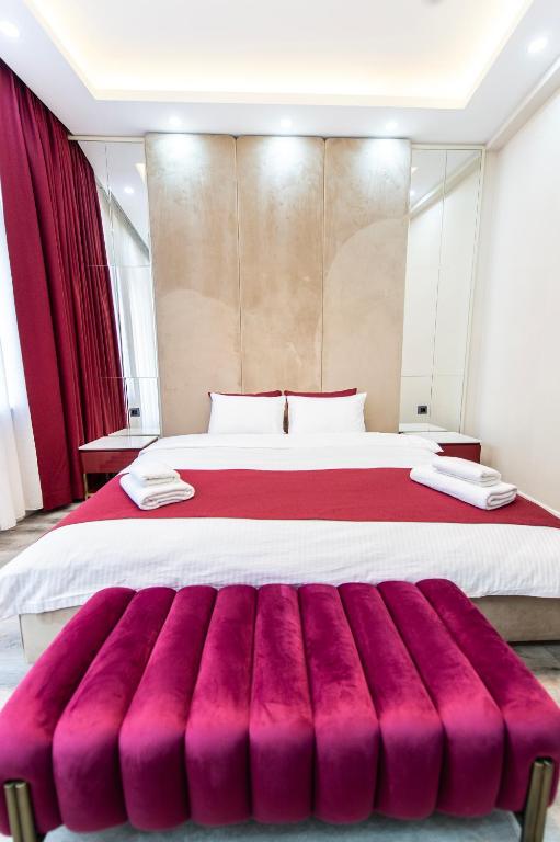 Postel nebo postele na pokoji v ubytování Hidden Pearls Boutique Hotel