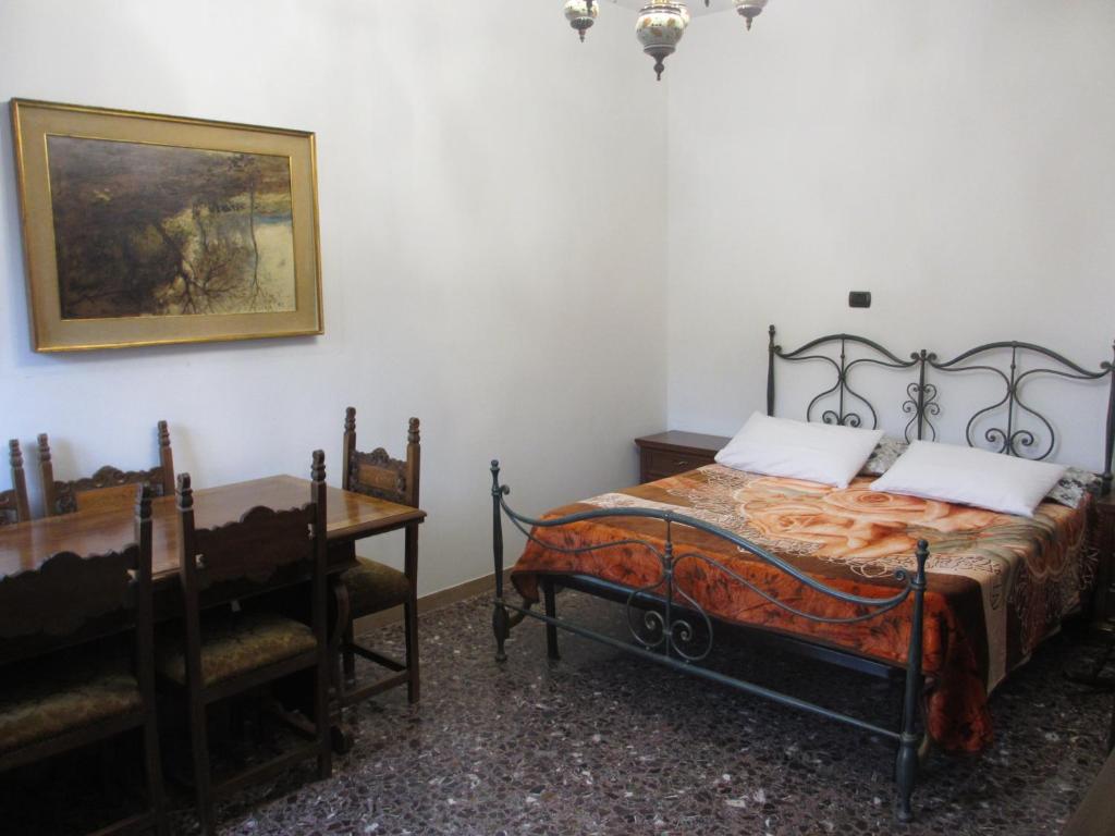 Postel nebo postele na pokoji v ubytování B&B Mariarosa - Modena