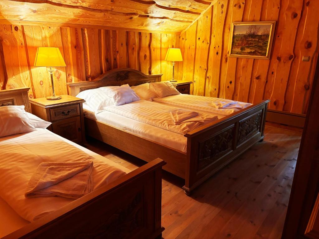 Postel nebo postele na pokoji v ubytování Levendula Resort és Rendezvényközpont