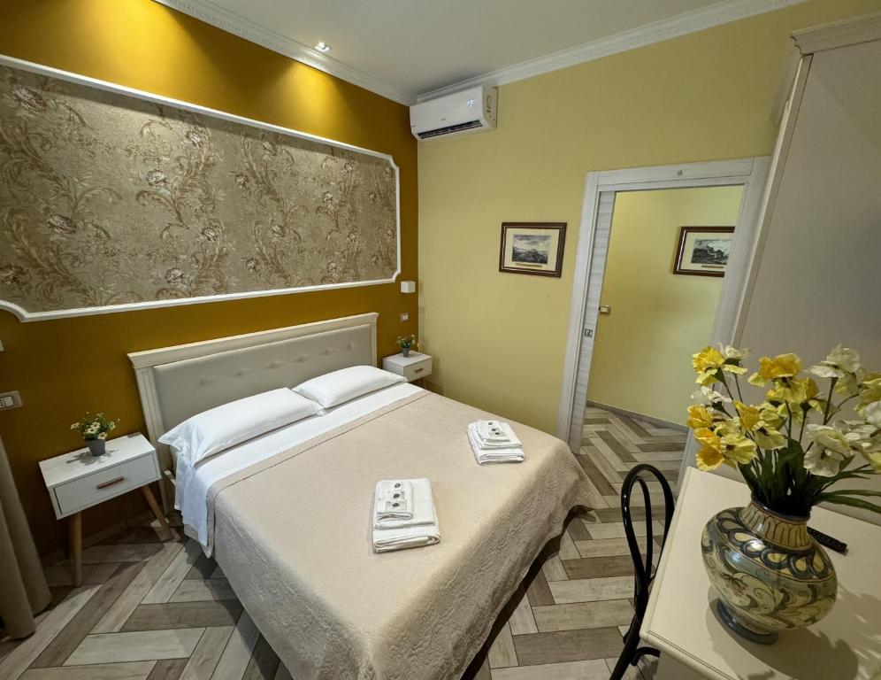 Posteľ alebo postele v izbe v ubytovaní B&B Fiorentino