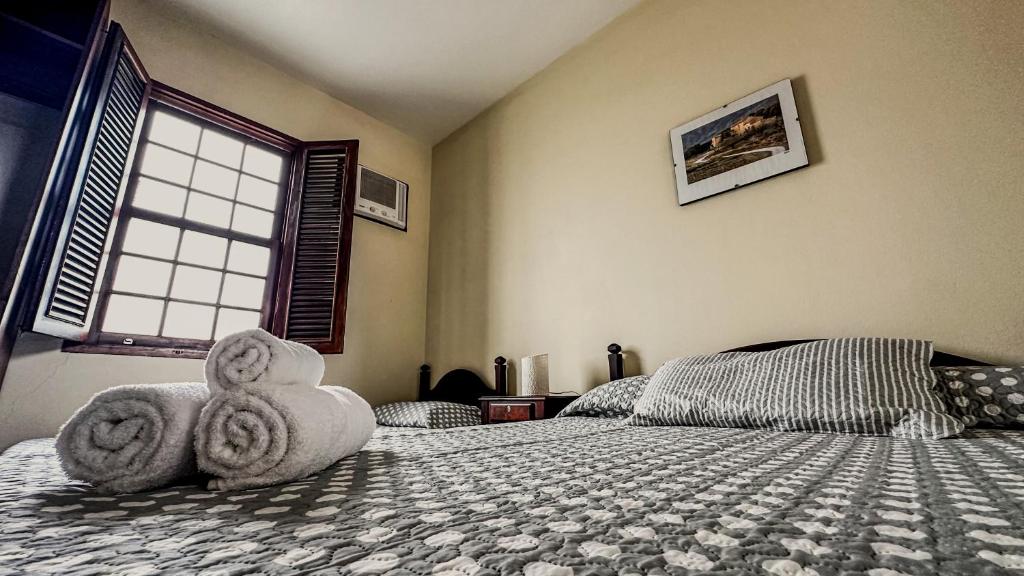 Postel nebo postele na pokoji v ubytování Pousada Villa Aman