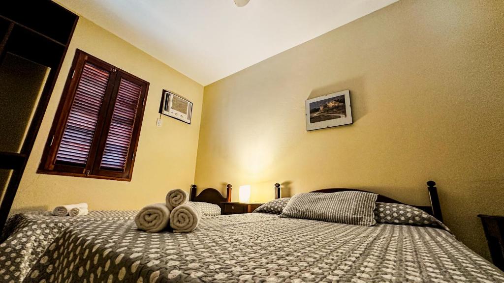 Postel nebo postele na pokoji v ubytování Pousada Villa Aman