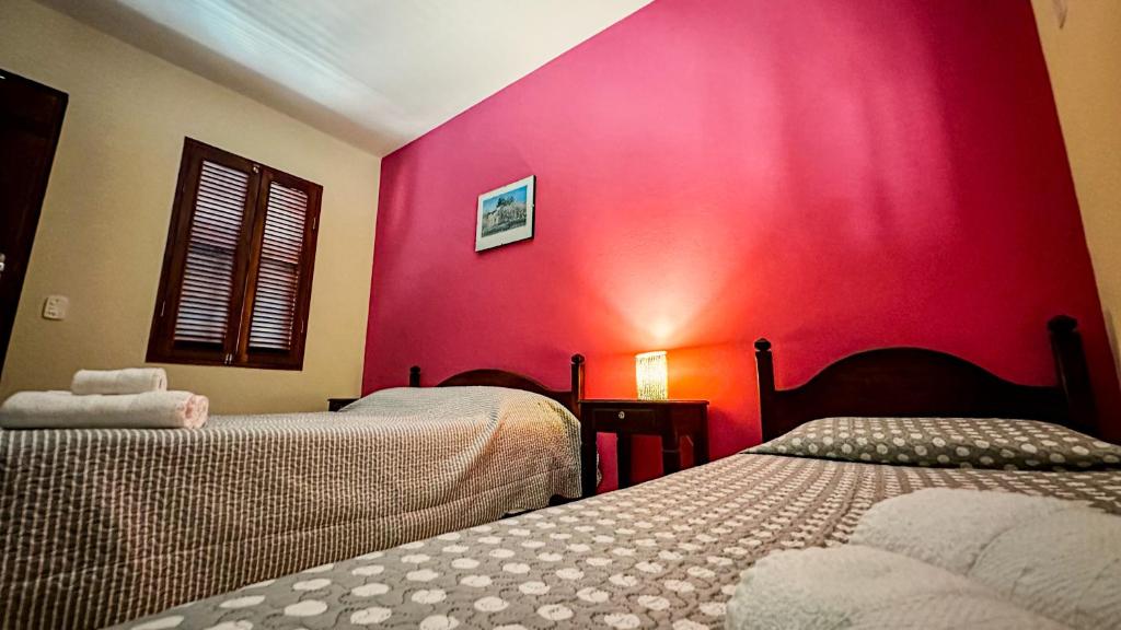 Postel nebo postele na pokoji v ubytování Pousada Villa Aman