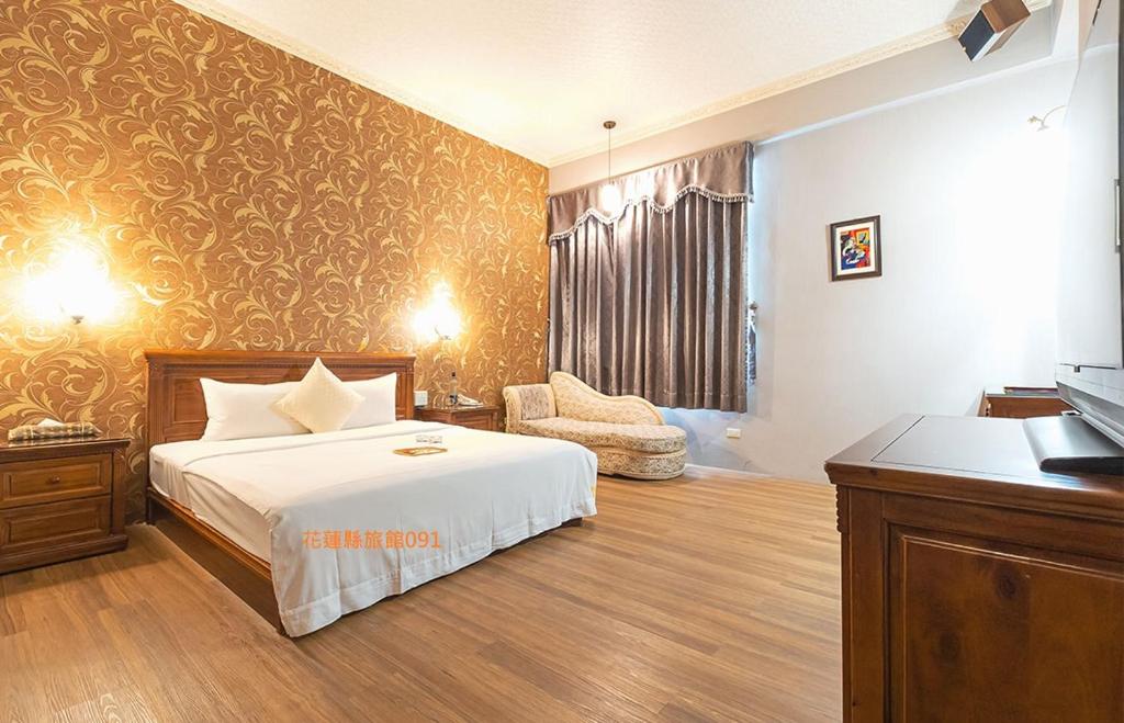 Postel nebo postele na pokoji v ubytování Di Bao Motel