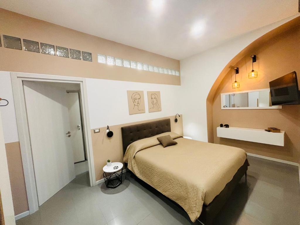 Postel nebo postele na pokoji v ubytování Casa F. I.