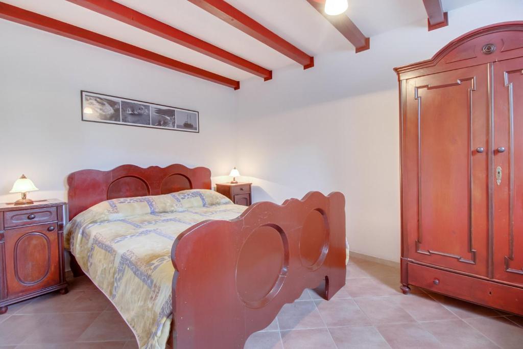 Posteľ alebo postele v izbe v ubytovaní Apartments Franjo