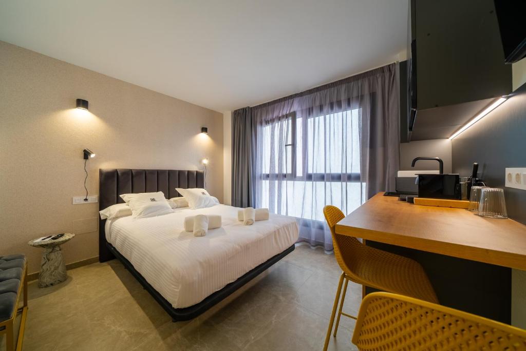 Postel nebo postele na pokoji v ubytování Alicante Smart Accommodation