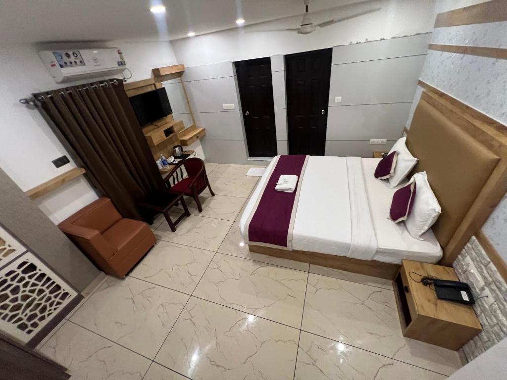 Postel nebo postele na pokoji v ubytování TCS SUITES