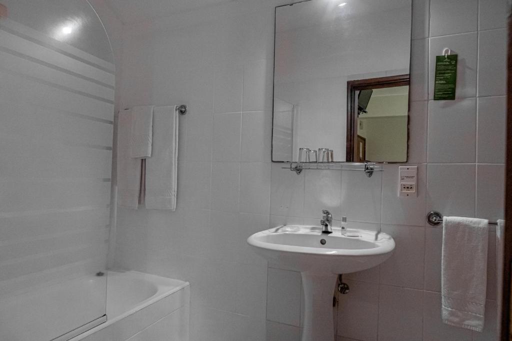 Koupelna v ubytování Residencial Chafariz /Queimada