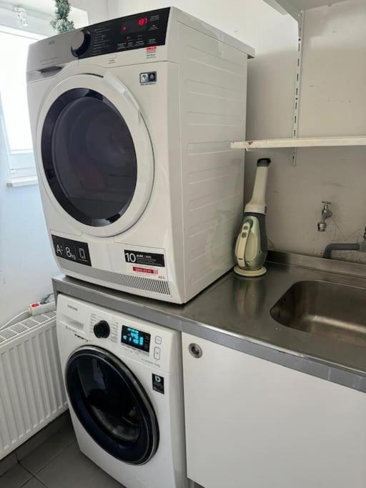 Kuchyň nebo kuchyňský kout v ubytování Vakantiewoning dichtbij zee