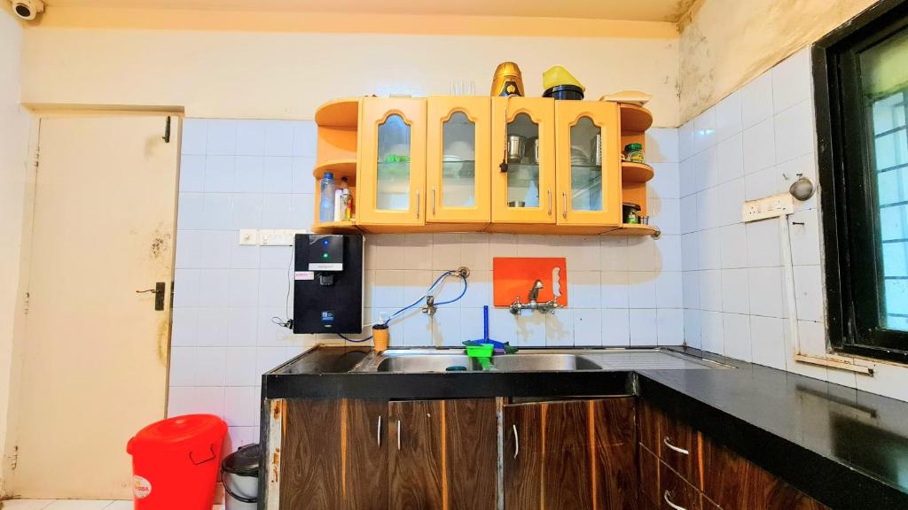 Kuchyň nebo kuchyňský kout v ubytování Rostel Backpackers Hostel