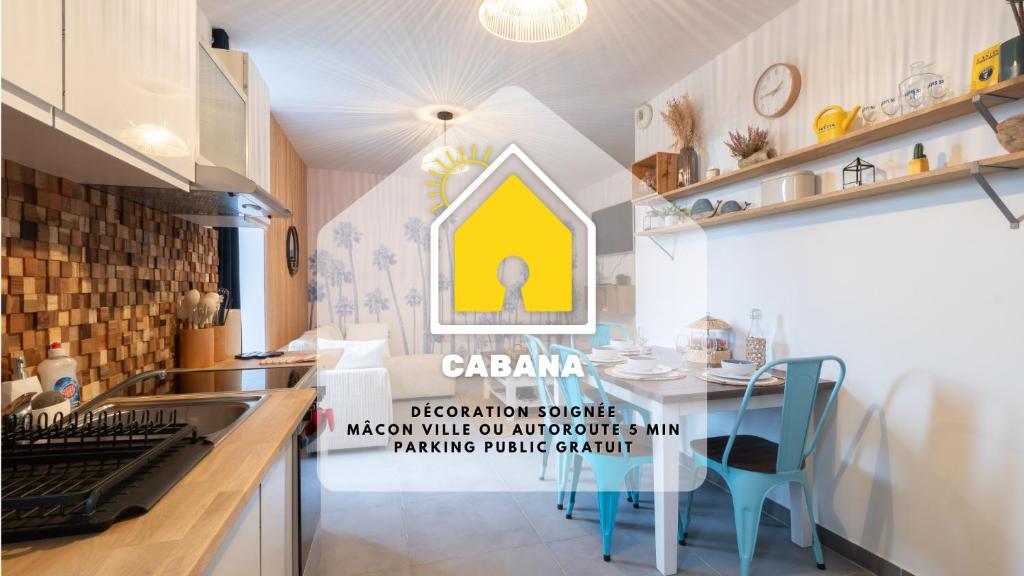 una cocina con un letrero que dice "caramaption volume mason wide" en otro en Cabana & On dirait le Sud, en Flacé-lès-Mâcon
