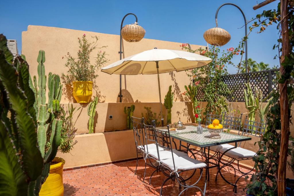 Patio alebo iná vonkajšia časť ubytovania Riad Sun of Kech