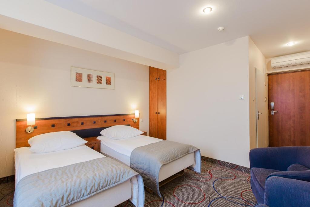 Posteľ alebo postele v izbe v ubytovaní Qubus Hotel Głogów