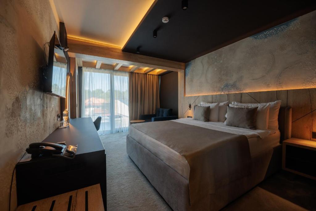 Krevet ili kreveti u jedinici u okviru objekta HOTEL ROYAL MOUNTAIN