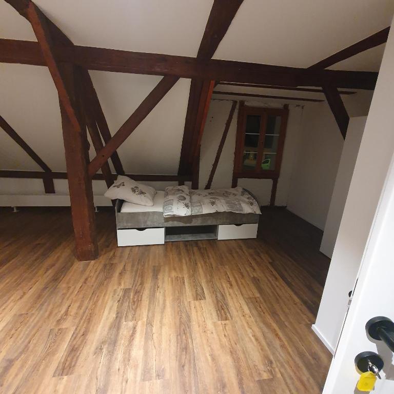 Postel nebo postele na pokoji v ubytování Gästehaus Lindenplatz