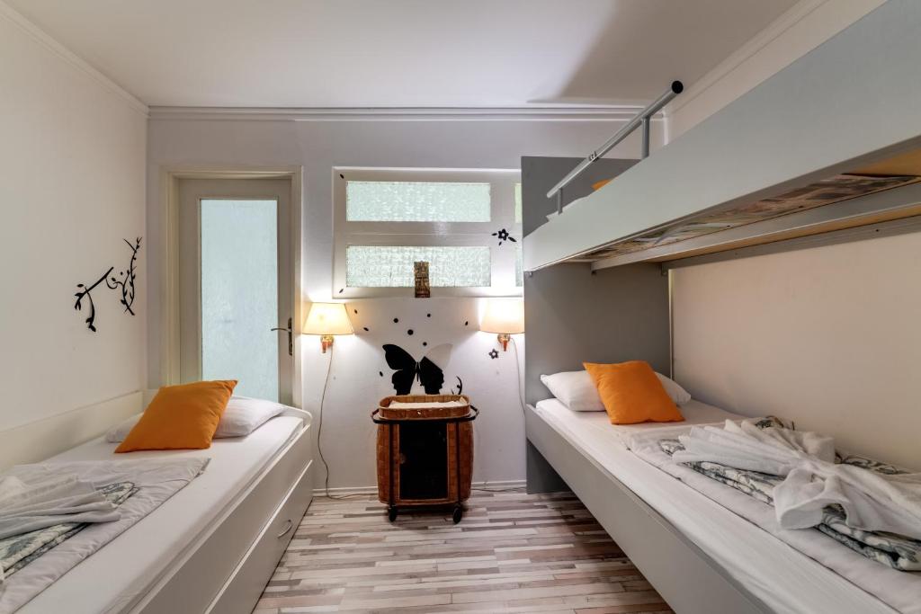 Postel nebo postele na pokoji v ubytování B&B Apartments Coli apartments Afrodita & Antonia