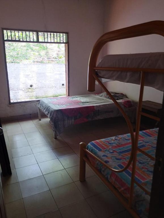 Postel nebo postele na pokoji v ubytování santa cecilia