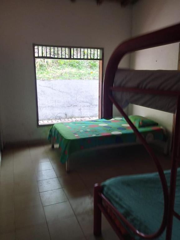 Postel nebo postele na pokoji v ubytování santa cecilia