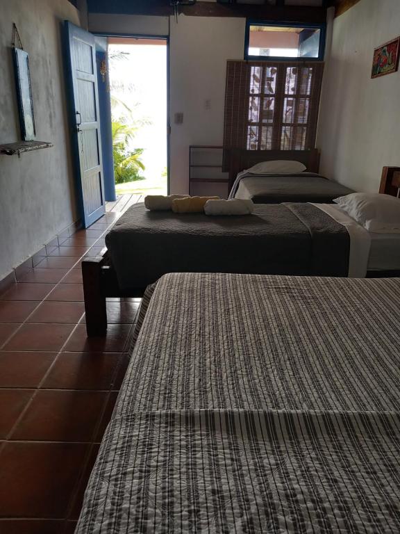 Postel nebo postele na pokoji v ubytování Hostal Surfers Paradise