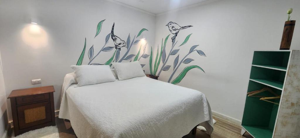 Postel nebo postele na pokoji v ubytování HOSTAL LA MODERNA