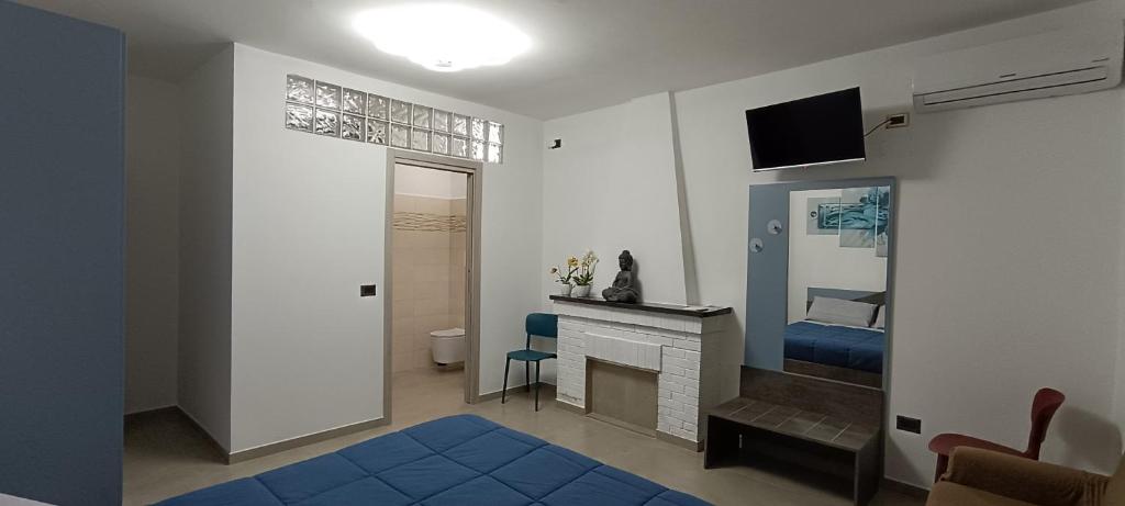 TV a/nebo společenská místnost v ubytování All inBasilicata Bed & Breakfast