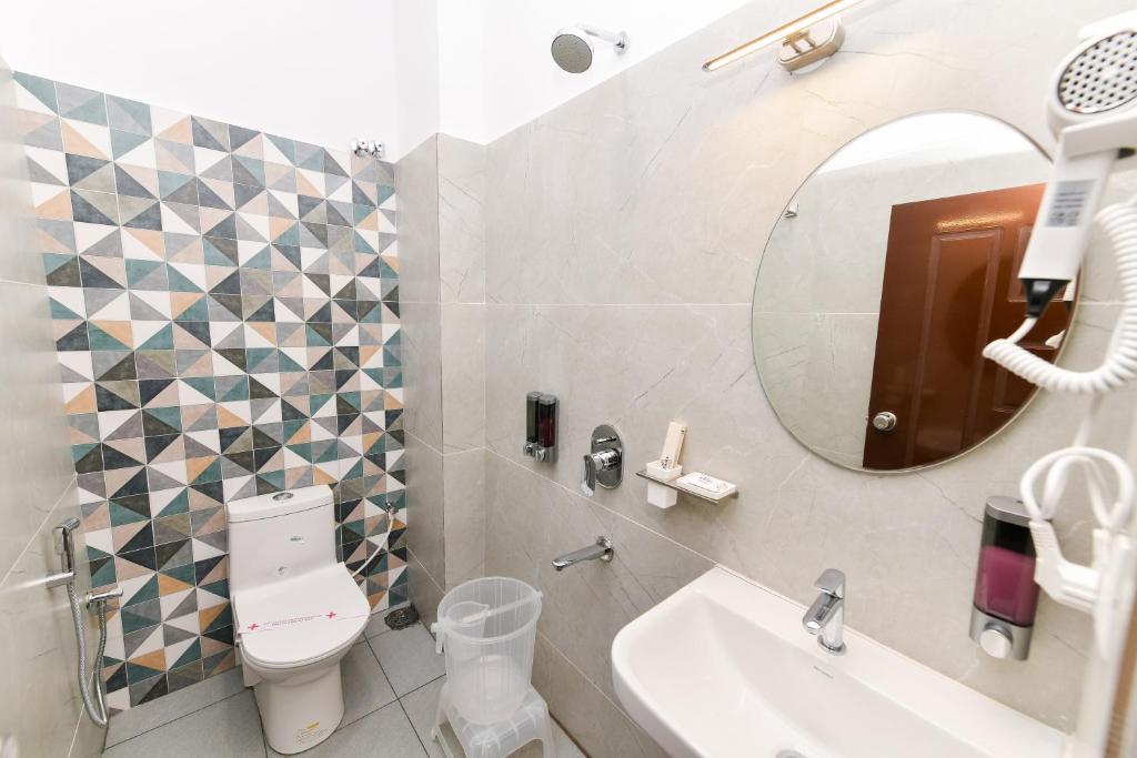 Koupelna v ubytování Hotel Shine International
