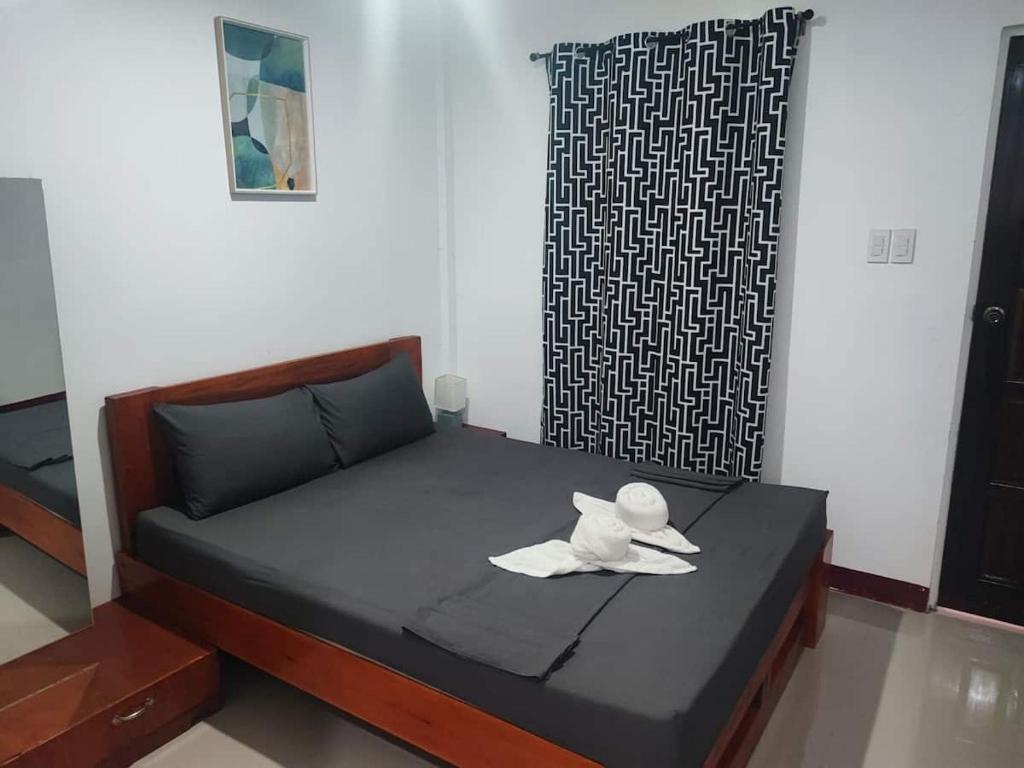 Postel nebo postele na pokoji v ubytování Bonsai Jacuzzi Suites