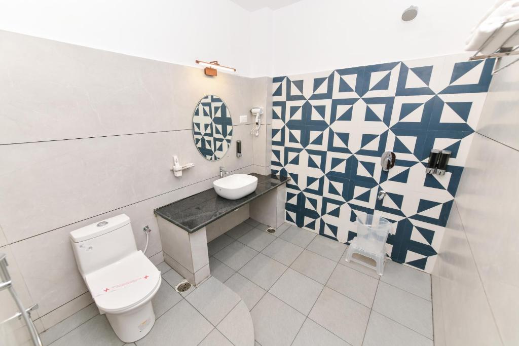 Koupelna v ubytování Hotel Shine International