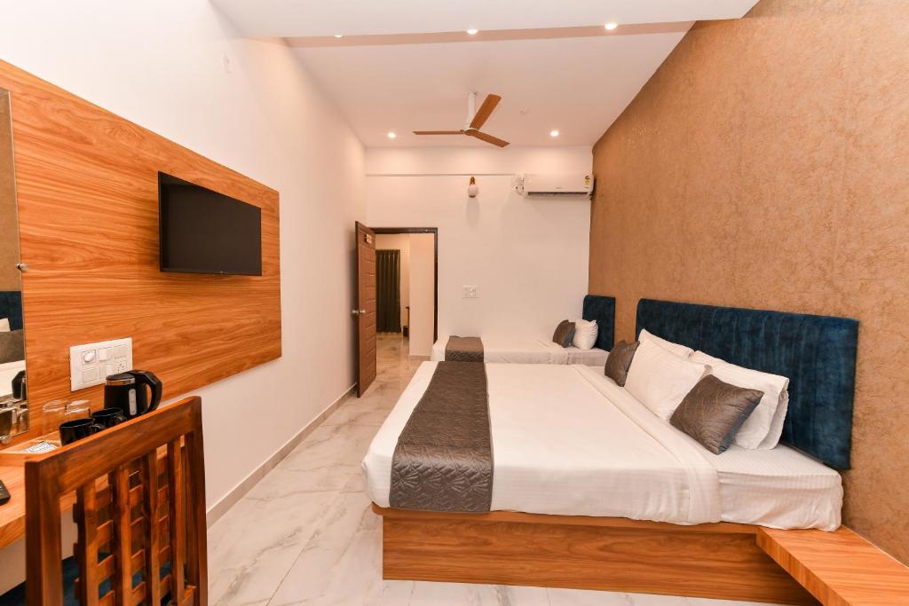 TV a/nebo společenská místnost v ubytování Hotel Shine International