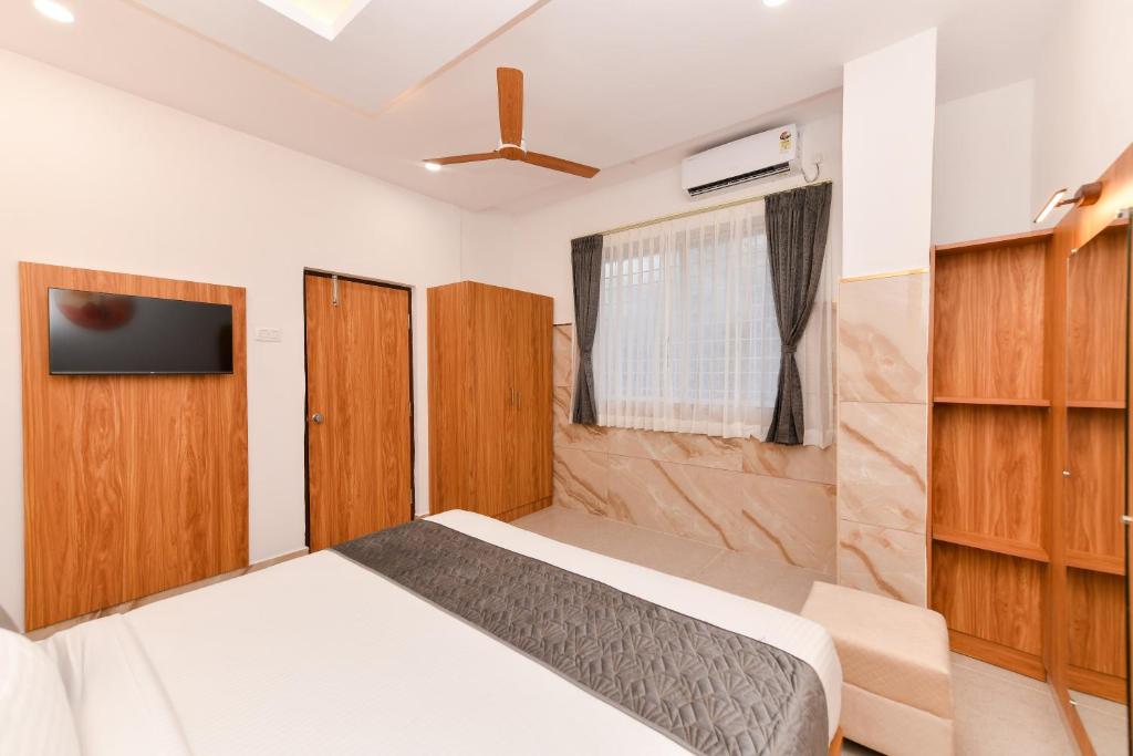 Postel nebo postele na pokoji v ubytování Hotel Shine International