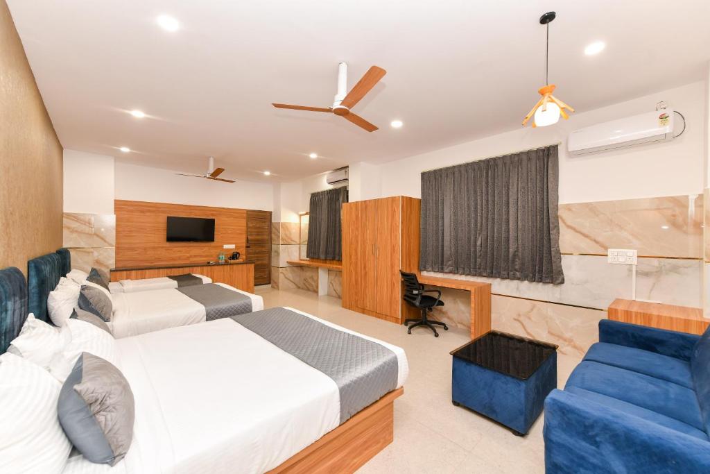 TV a/nebo společenská místnost v ubytování Hotel Shine International