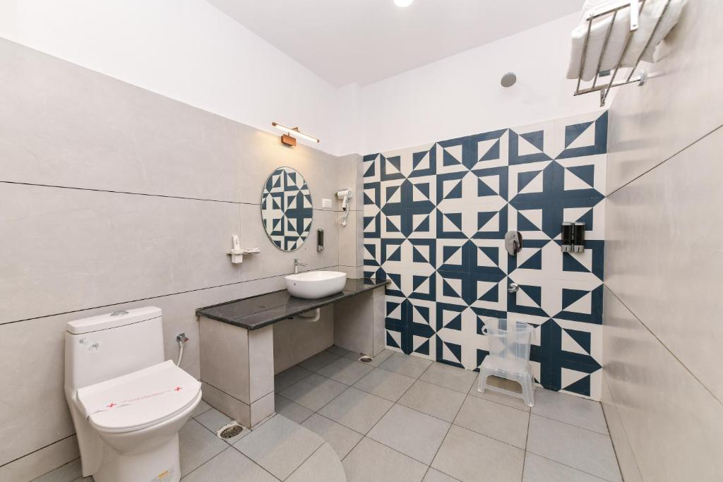Koupelna v ubytování Hotel Shine International