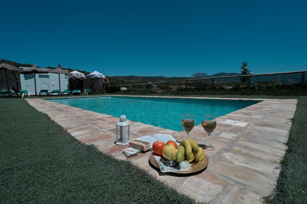 The swimming pool at or close to Rincón de Marco y María