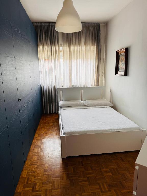 Łóżko lub łóżka w pokoju w obiekcie Lovely apartment in Gallarate