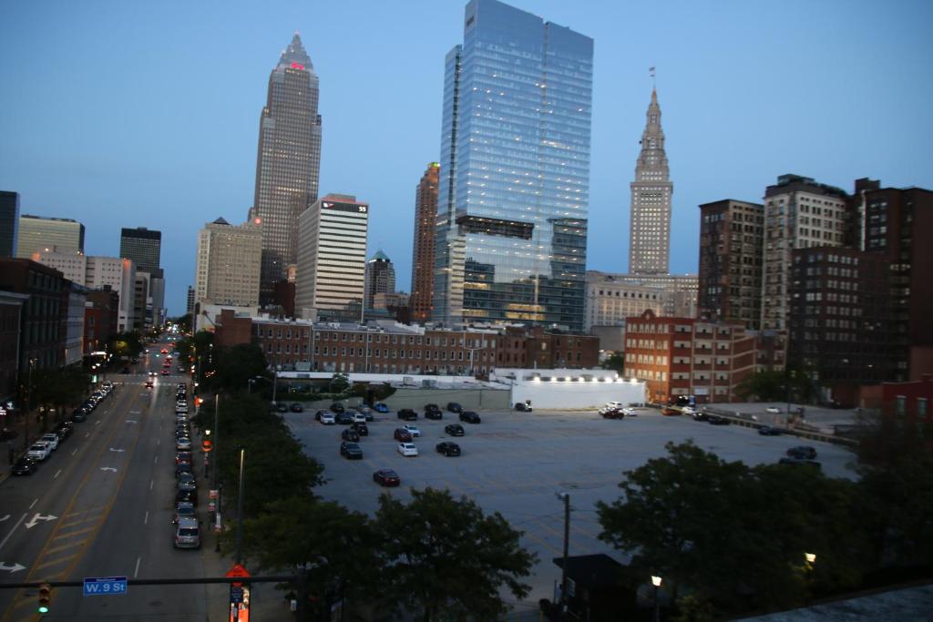 a large parking lot in a city with tall buildings at Downtown Cleveland Historic District in Cleveland