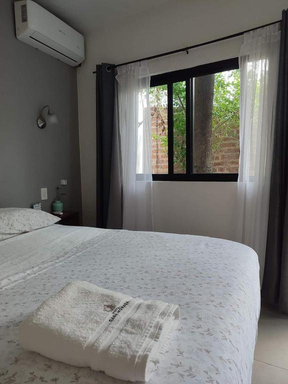Postel nebo postele na pokoji v ubytování Hostal Casa Morada