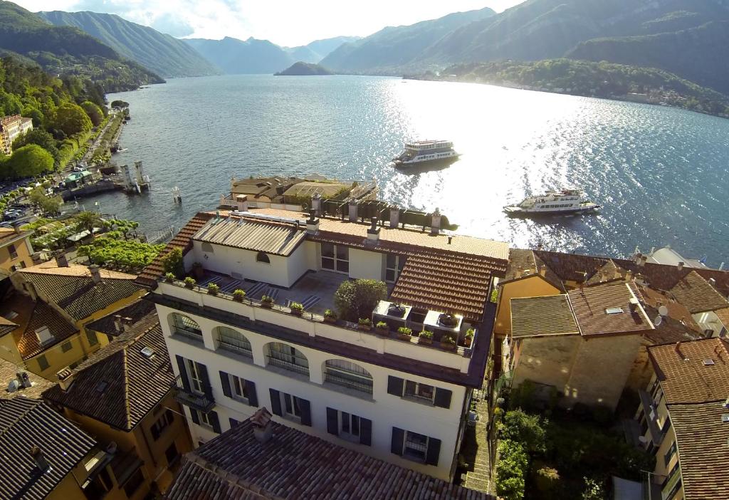 an aerial view of a building next to a body of water at Hotel Bellagio in Bellagio