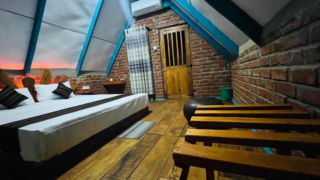 Postel nebo postele na pokoji v ubytování Ali Adi Eco Resort